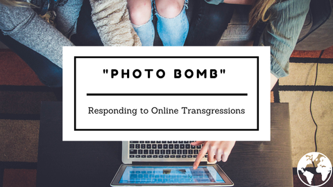 teenagers pointing at laptop